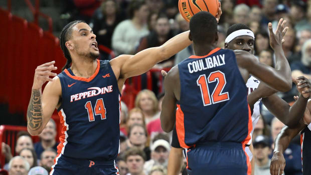 Jan 4, 2024; Spokane, Washington, USA; Pepperdine Waves forward Jevon Porter (14) intercepts the Gonzaga Bulldogs pass in the first half at Spokane Arena.